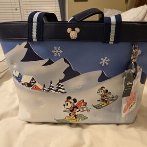 Box Lunch Disney Mickey & Friends Ski Tote with matching wristlet and dust bag.
